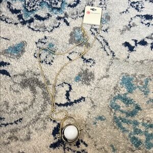 Long Gold Tone Necklace with Tound White Pendant